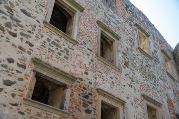 Example of empty windows in the wall of a medieval castle.
