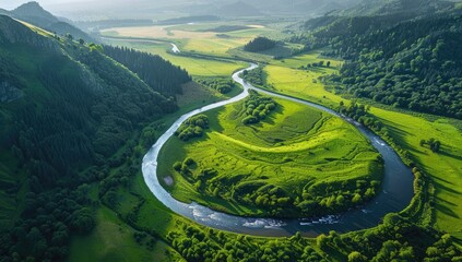 Aerial view meandering river valley, sunrise, green hills, travel brochure