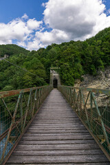 Fototapeta premium Lago del Corlo with Ponte della Vittoria Bridge in Belluno ,Italy