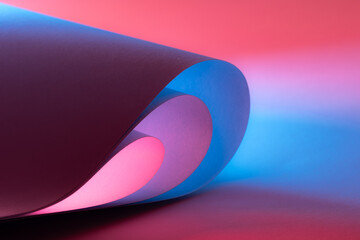 Colorful abstract curves in shades of blue, red and velvet tints creating a dynamic visual...