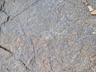 Detailed rocky texture background with intricate cracks and natural formations