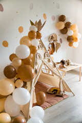 teepee and balloons birthday in boho style with rainbows