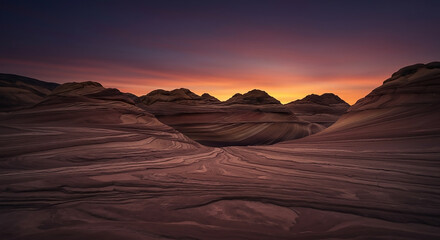 Naklejka premium Sedimentary twilight masterpiece A vibrant sunset glows over the flowing, layered rock formations of a desert canyon.