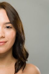 Latin woman showing glowing skin for skincare campaign