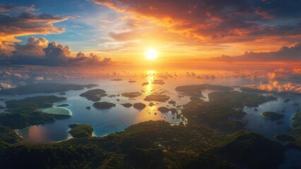 Obraz premium Aerial Majesty A Fiery Sunset Over a Labyrinth of Tropical Islands and Turquoise Waters.