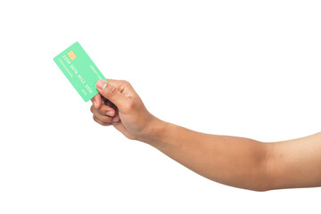 A hand holding a green credit card against a clean white background showcasing financial transaction