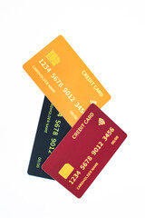 Colorful Credit Cards Stacked on White Background Representing Finance and Spending