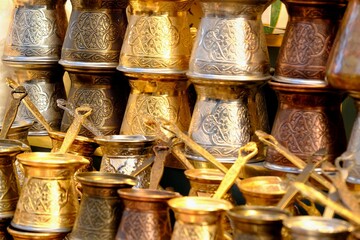 Copper coffee pots decorated with traditional Turkish inlays. Copper coffee pots sold at souvenir...