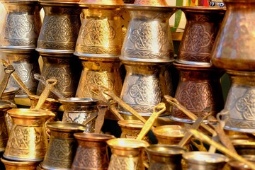 Copper coffee pots decorated with traditional Turkish inlays. Copper coffee pots sold at souvenir...