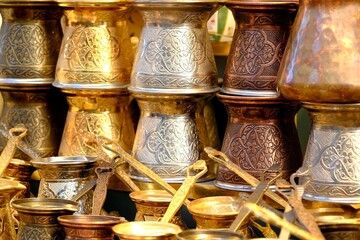 Copper coffee pots decorated with traditional Turkish inlays. Copper coffee pots sold at souvenir...