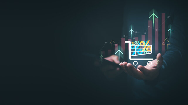 E-commerce market growth concept, a businessman showing the graph of online shopping growing continuously, showing customer consumption rate, delivery service, and shopping cart.