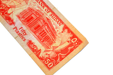 the reverse side of 50 PT fifty Sudanese piastres cash money banknote, features Central Bank of Sudan building, Khartoum, old Sudanese money banknote bill