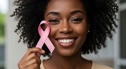 A beautiful person with a pink ribbon shows solidarity with the support of breast cancer. 