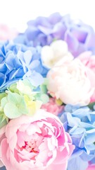 Delicate pastel flowers in a close-up arrangement.