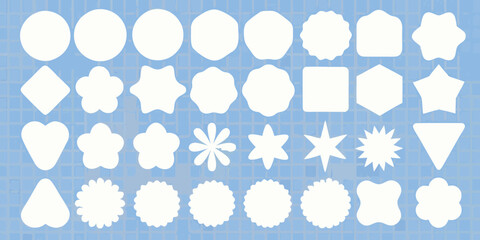 Collection of diverse white decorative shapes on a blue grid background