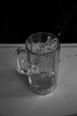 glass of water on black background