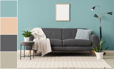 Interior of stylish living room with sofa near mint wall. Different color patterns