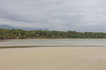 paradisiac beach in Bertioga São Paulo, with cloudy sky a beautiful and calm place.
