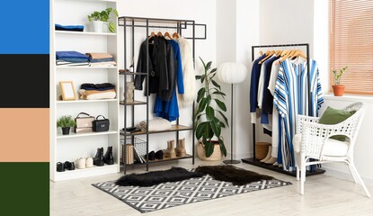 Obraz premium Shelving unit and racks with hanging clothes in light dressing room. Different color patterns