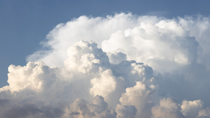 blue day with sky with dramatic cloud formation 