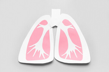 Paper lungs on grey background