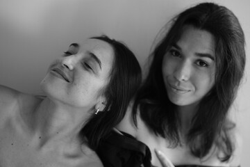 Closeup of Two Women Smiling Together