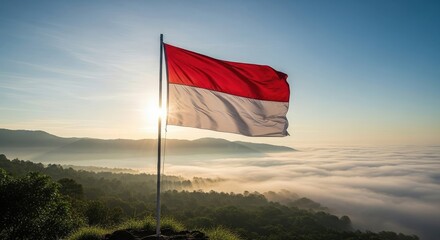 Flag waving over misty sunrise landscape