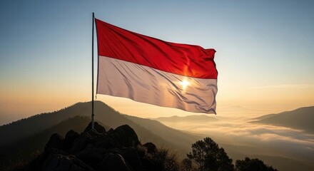 Flag waving over mountains sunrise