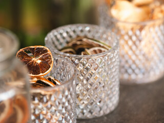 close up citrus garnishes in glasses for cocktail in a beach bar, landscape format