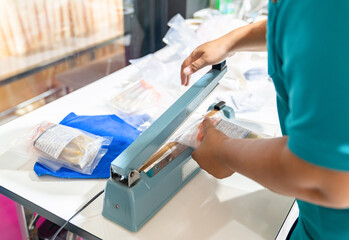 Packaging Process with a Heat Sealer