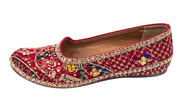 Elegant embroidered red jutti with intricate gold detailing perfect for festive occasions