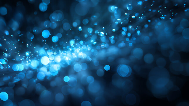 A stunning abstract background featuring a cascade of shimmering blue lights and bokeh effects, perfect for creative projects.