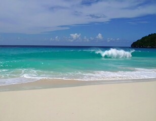 Turquoise ocean waves on white sand beach