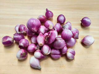 Organic Shallots, A Culinary Essential on a Rustic Wooden Background