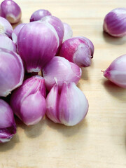 Rustic Still Life of Shallots on a Simple Wooden Background