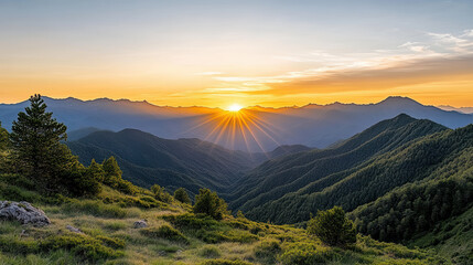 Obraz premium Breathtaking mountain landscape at sunset with vibrant sun rays illuminating peaks