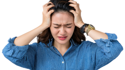 Stressed woman holding her head in frustration against a white background.