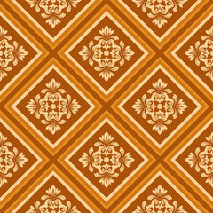Elegant geometric pattern in shades of gold and brown with decorative floral motifs. The intricate design repeats across the surface, creating a sense of luxury and sophistication