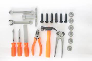 Toy craftsman tools on white background