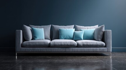 A modern, minimalist sofa with blue cushions against a dark blue wall.