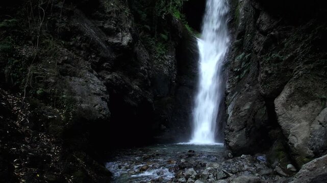 This breathtaking video captures Bangoru Waterfall as it flows powerfully through rocky mountain terrain in the lush green forests of Kangra district, Himachal Pradesh, India.