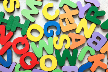 Many English letters on light background