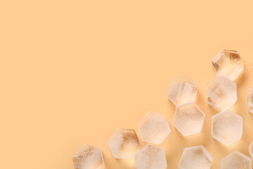 Frozen ice in shape of hexagon on yellow background