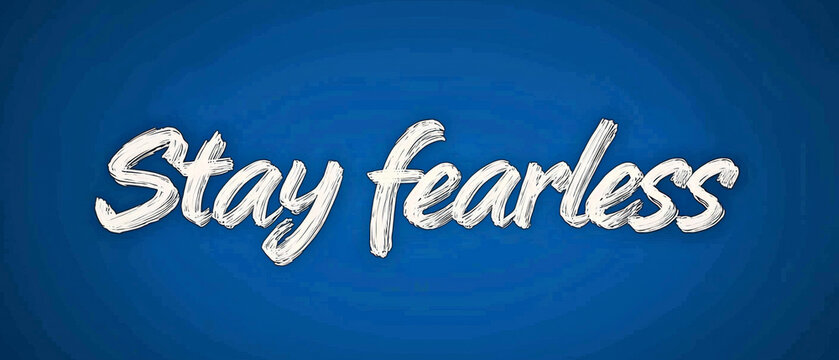 Stay Fearless: Bold white brush lettering on blue