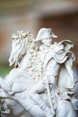 Fototapeta premium A statue of Napoleon riding a white horse