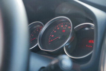 Speedometer shows vehicle speed during daylight drive