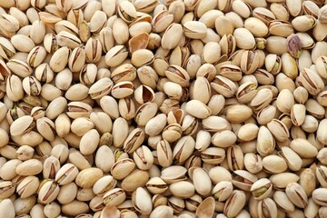 Tasty unpeeled pistachios as background, top view flat lay background