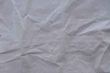 Brown crumpled recycled paper texture background. Kraft Paper