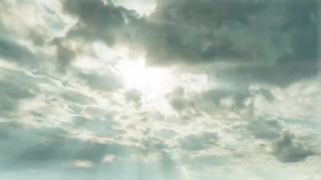 Realistic blue sky time lap with gray cloud background.