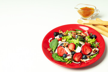 Concept of tasty food, salad with strawberry, space for text